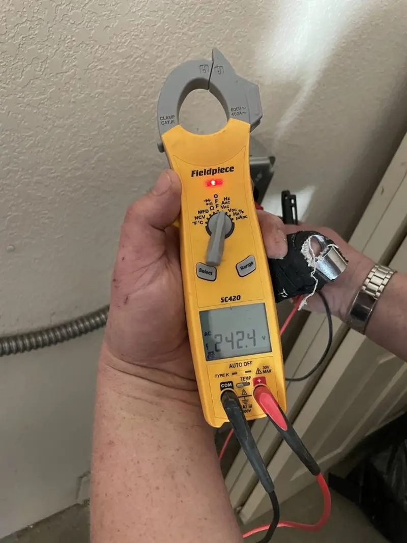 Voltage testing with clamp meter during Generator Installation in Derby